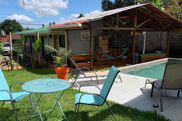 outdoor patio lounge chairs in sunny yard